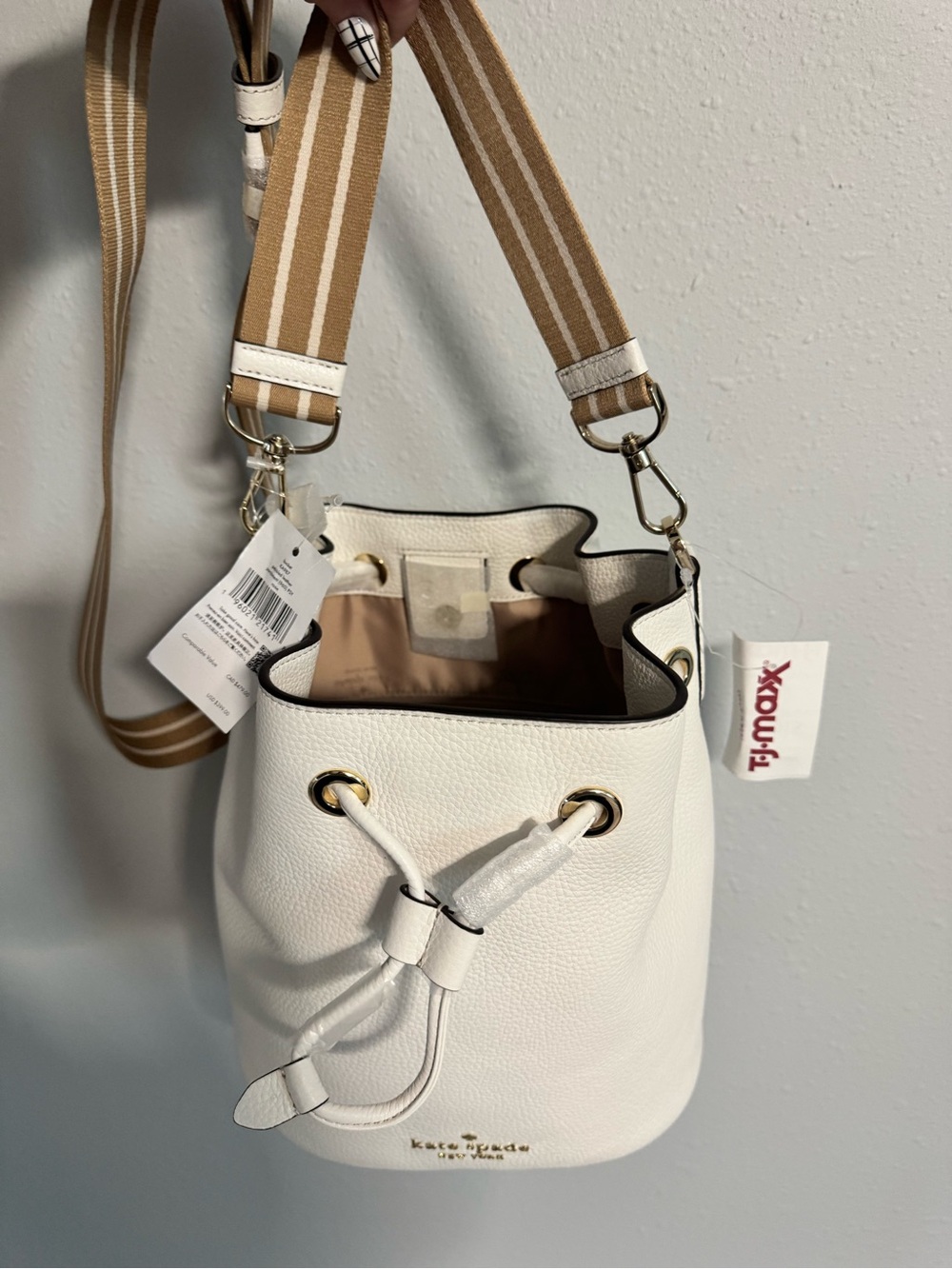kate spade White Pebbled Leather Drawstring Bucket Bag with Tan Striped Strap